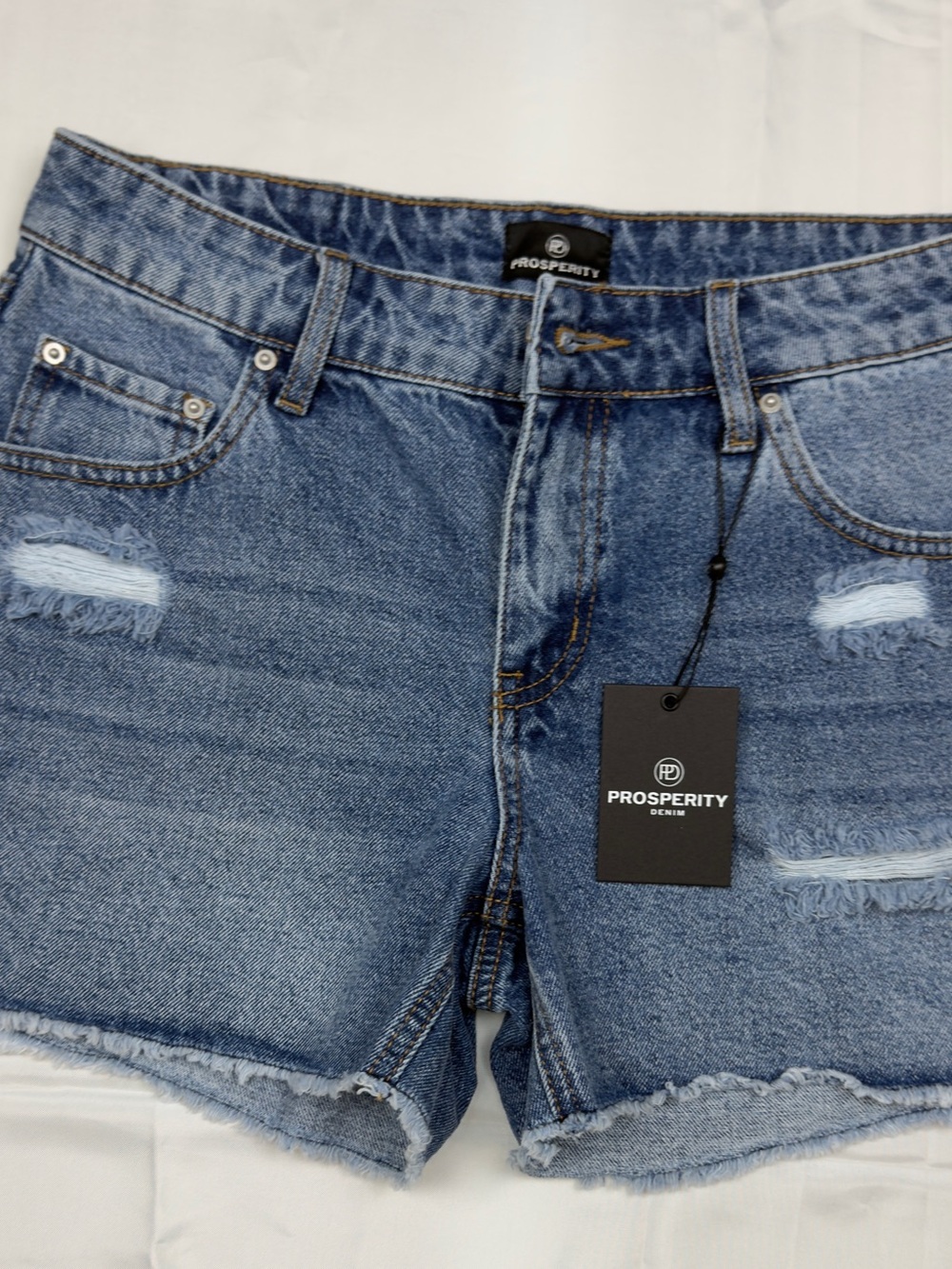 Prosperity Women's Blue Distressed Denim Shorts